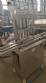 Envasadora linear 6 cilindros em inox Edwards