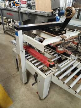 Fechadora seladora de caixa de papel�o Strapack