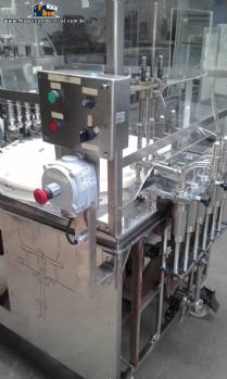 Envasadora rotativa com tampadora 6 bicos em inox Envasadora rotativa com tampadora 6 bicos em inox